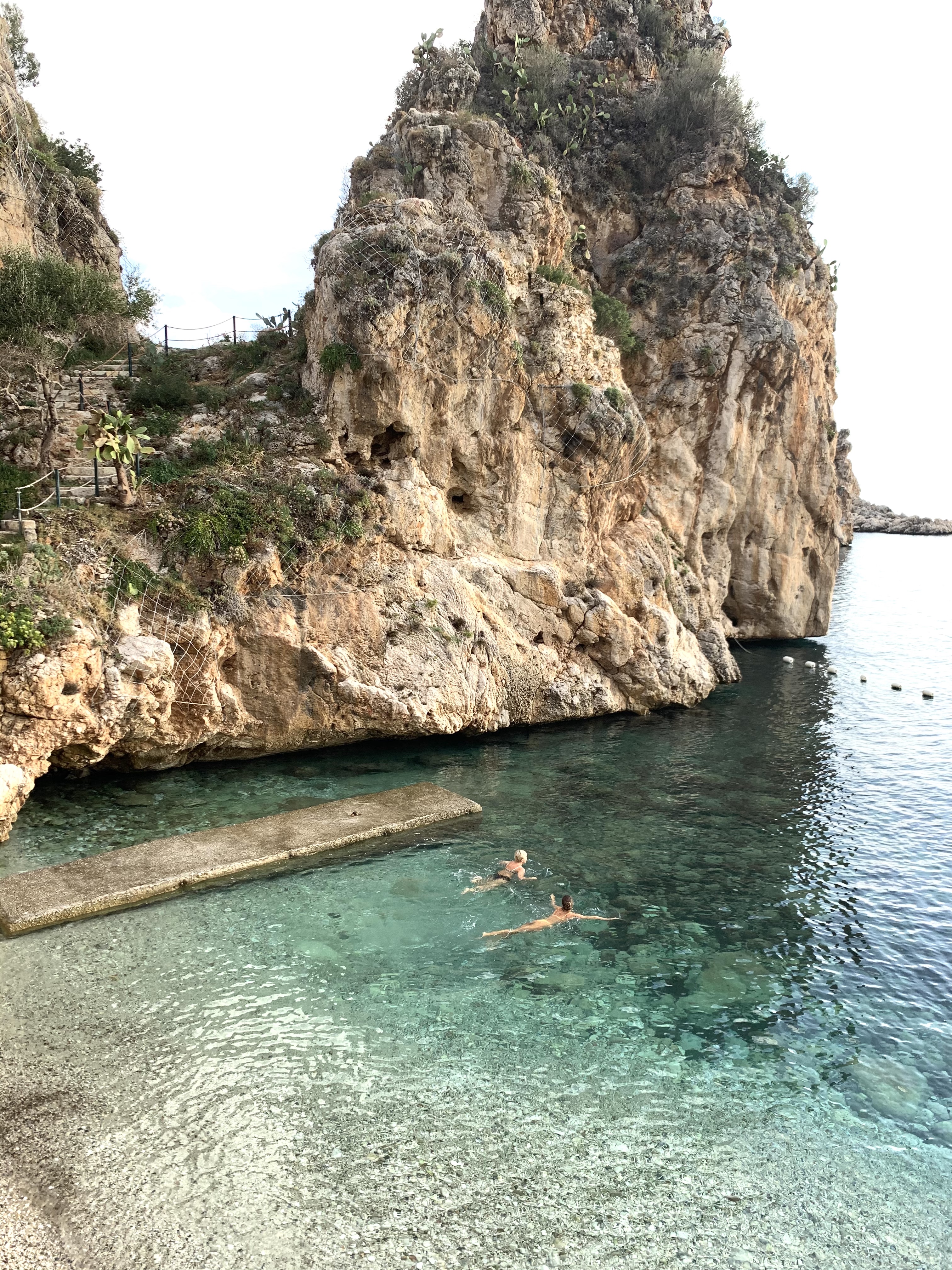 Swimming in the private bay of Tonnara di Scopello. Only Tonnara's guests can swim here.