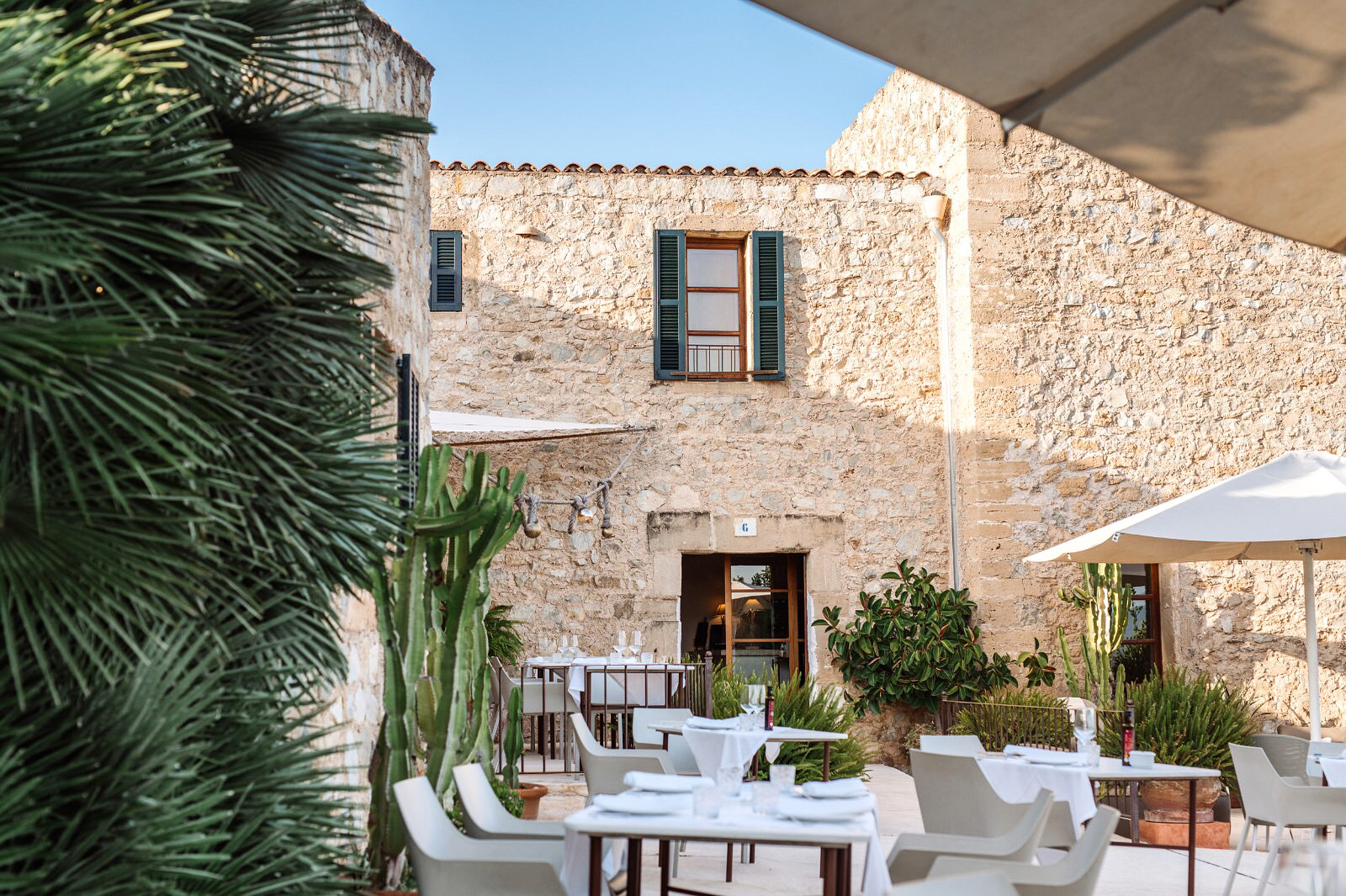One of my top choices for a budget but beautiful hotel to stay in Mallorca - Cases de son Barbassa // Photo Credit Cases de son Barbassa