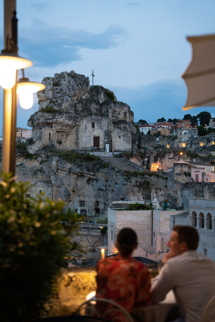 Matera at sunset from Restaurant Regiacorte. Photo credit @roamandthrive